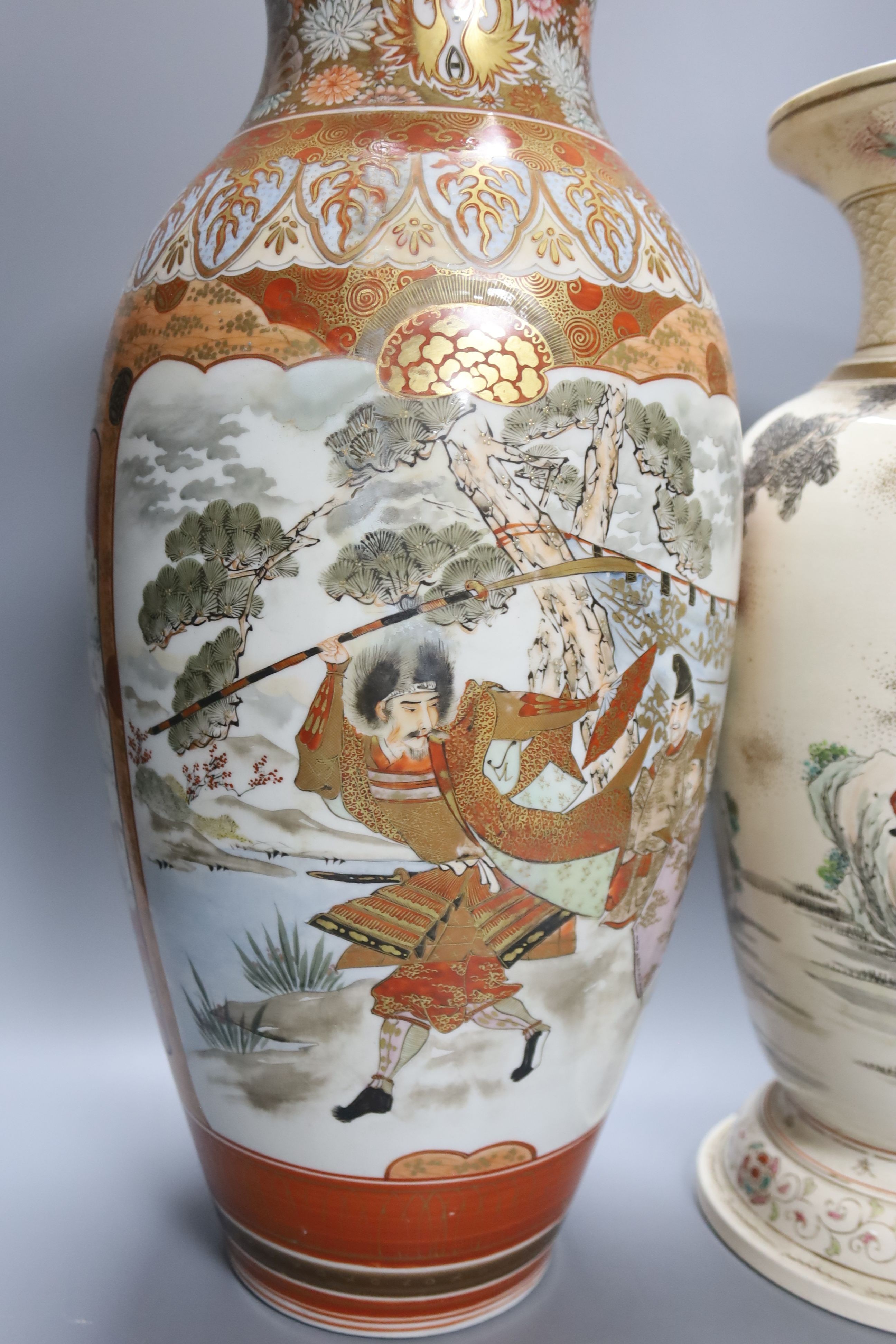 A large Japanese Kutani porcelain vase and a large Japanese Satsuma pottery vase, impressed Kozan mark, both restored 46cm